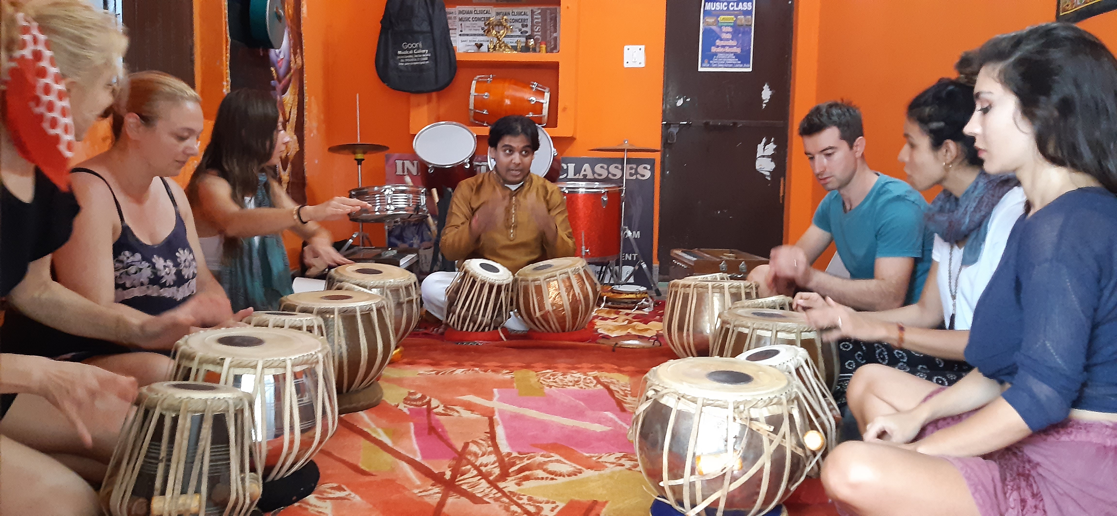 Sunrise music practice by the Ganga