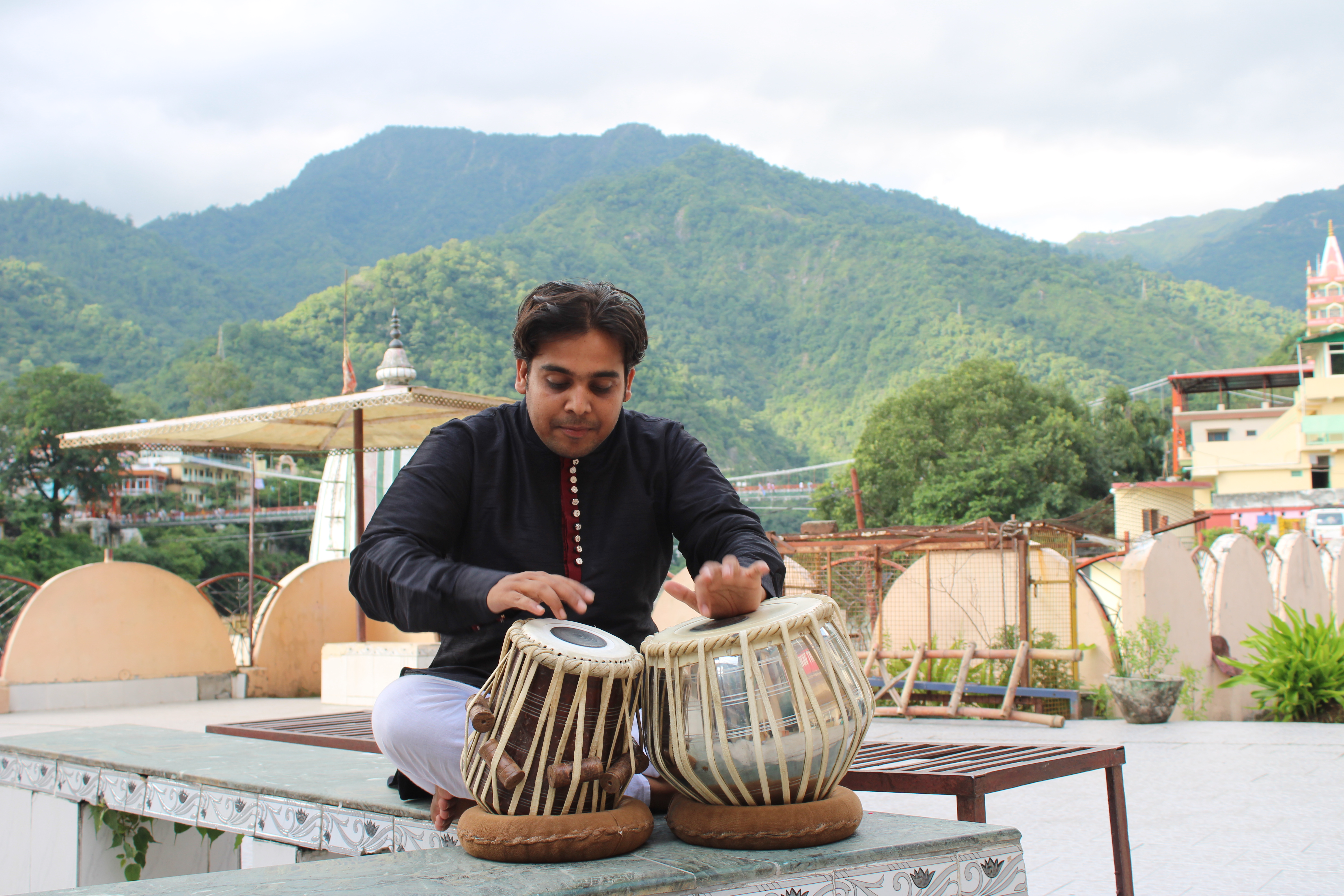 International student learning bansuri